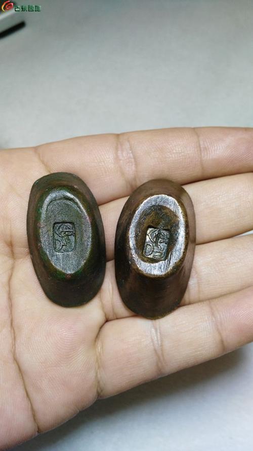 两枚寿字铜元宝
