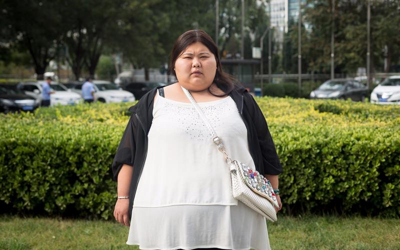 一家四口体重超千斤 弟失明姐失恋全因肥胖