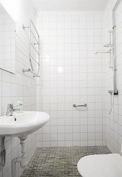简单卫生间装修白色瓷砖贴效果图