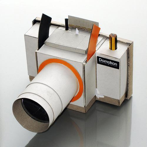 数码相机/dv > 正文    硬纸壳针孔相机     这款用废纸再造的针孔