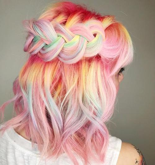 pink hair with rainbow coloring is a bold idea to rock, accent