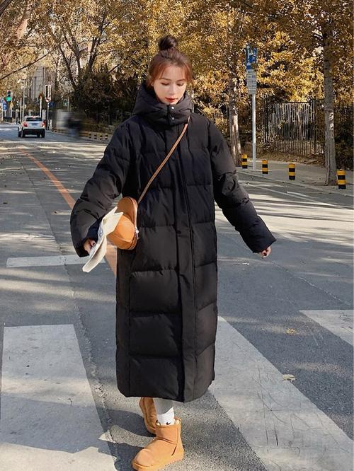 2021年新款黑色长款羽绒服女冬韩版宽松连帽过膝爆款今年流行外套