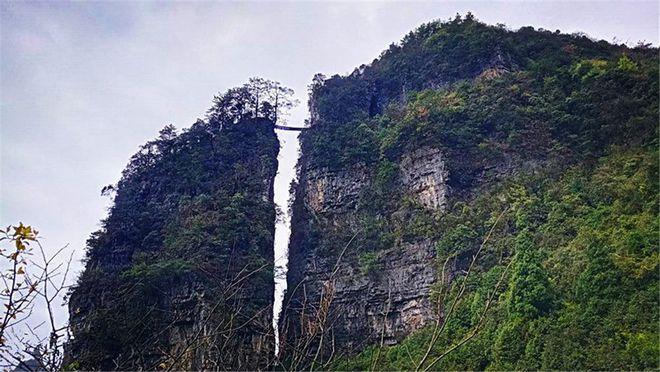贵州一座大山像巨型凤凰,搭建在空中的小木桥,几百年完好无损_网易
