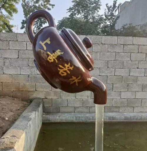 江西雕塑厂家玻璃钢悬空流水茶壶天壶雕塑模型景区网红打卡喷泉水池