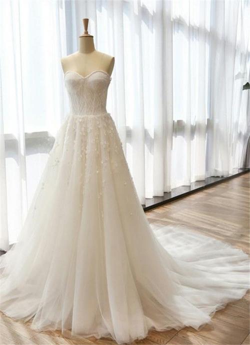 美丽的婚纱款式及图片大全 - 中国婚博会官网
