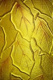 金红色立体树叶花纹装饰玻璃图案材质特写