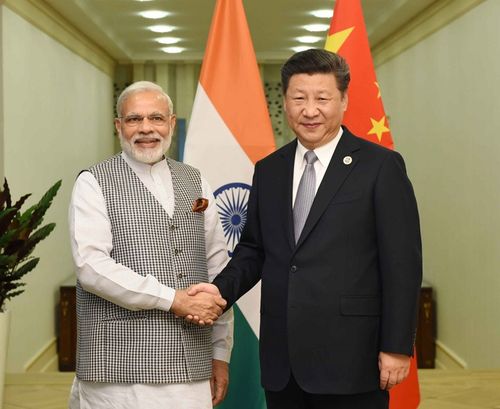 当地时间23日,国家主席习近平在塔什干会见印度总理莫迪.