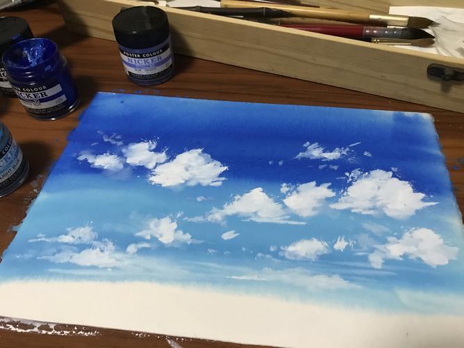 画水粉不用等待全干,用白颜料继续叠色,画出云朵的形状.
