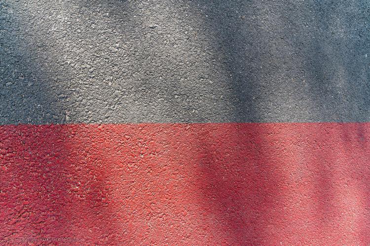 红与黑对比强烈的路面素材 街头 红色 纹理 素材 彩色 对比 墙 颜色