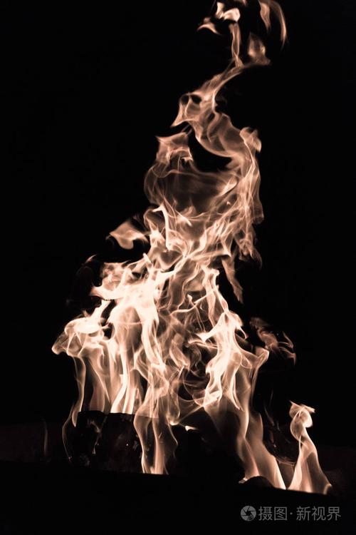恶魔般的火焰. 地狱之火. 背景来自舞蹈的火舌. 火灾危险. 消防安全.