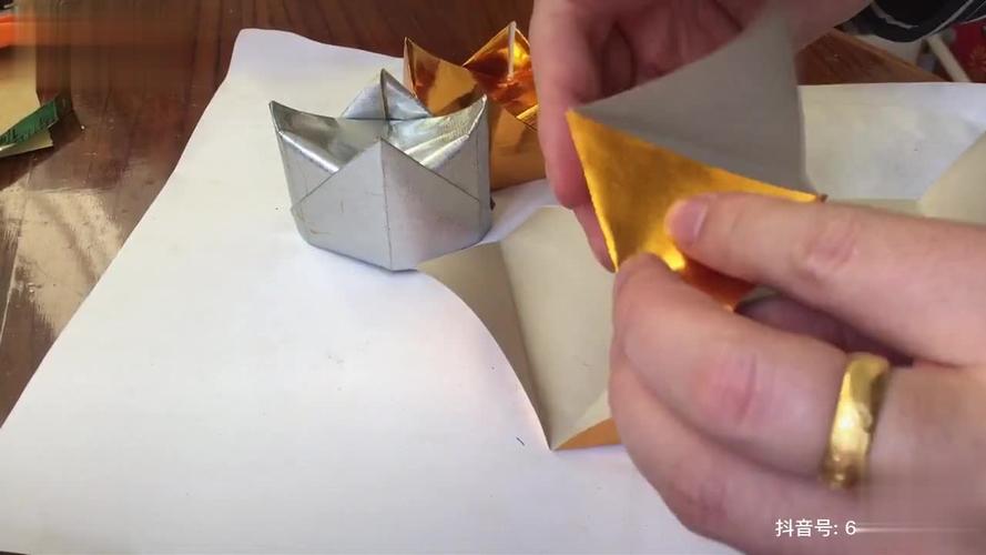 叠元宝 手工折纸 手工作品 折纸 锡箔四角元宝折法-生活视频-搜狐视频