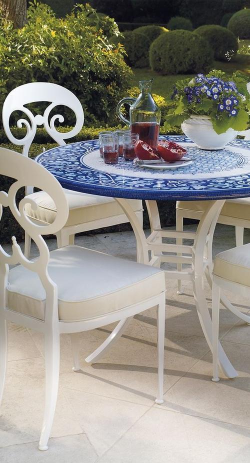 our italian bacchus hand-painted dining tabletop is crafted of