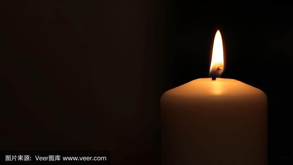 哀悼的蜡烛,悲伤和渴望.节日火宏背景.