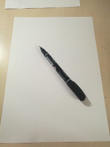 第二步:准备一张白纸和一根笔