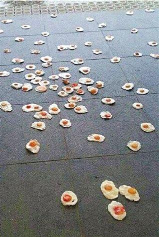 传杭州马路上煎鸡蛋 市民体验(图)
