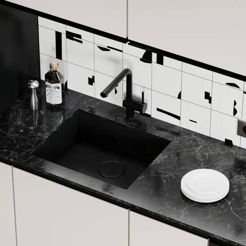 凸显奢华质感带有天然的纹路黑色大理石洗手台为厨房增添活力与个性