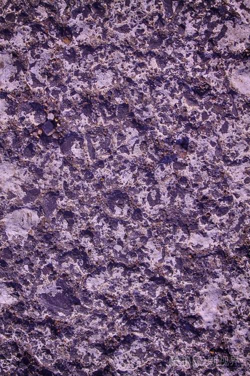 紫色花岗岩岩石特写背景石头纹理龟裂的表面