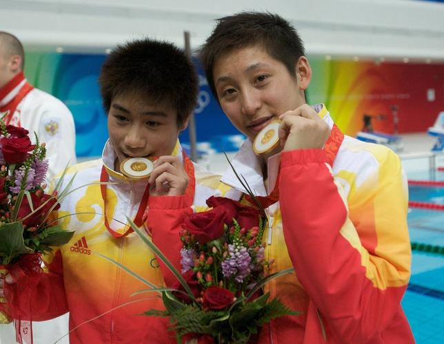 视觉中国张雁全(右).视觉中国冠军搭档陈艾森(左)和林跃.