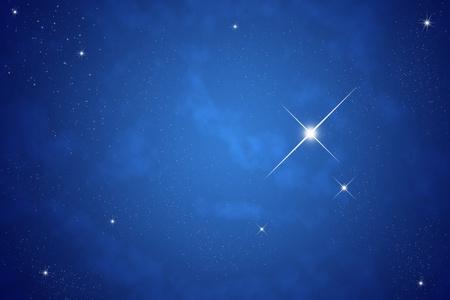 在夜晚的天空上的亮星照片
