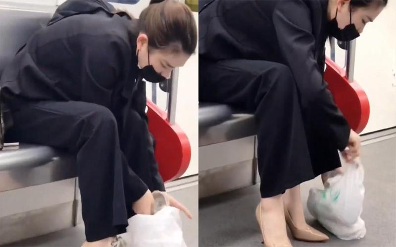 女子在地铁上脱下帆布鞋,随后拿出高跟鞋默默换上:都是为了生活