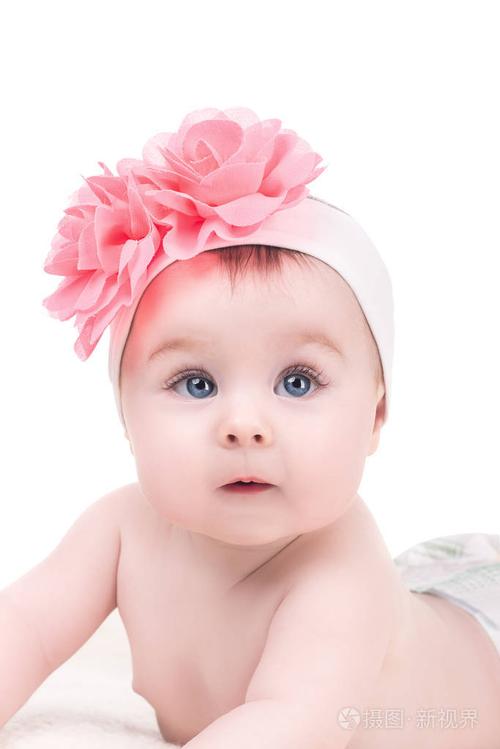 可爱的小宝贝女孩粉红色的蝴蝶结花她他的肖像照片-正版商用图片00wu1