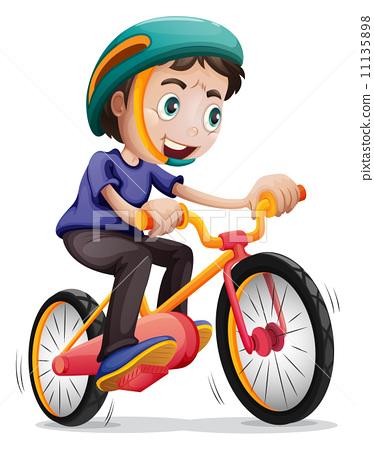 a young boy riding a bicycle