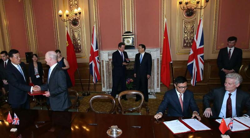 中英签署数十项协议 总额超过300亿美元
