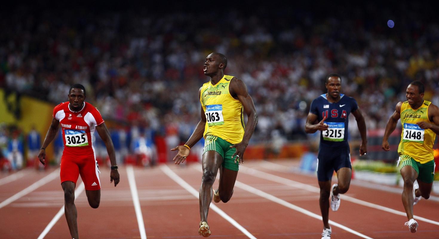 牙买加选手尤塞恩·博尔特(左二)在国家体育场"鸟巢"进行的北京奥运会